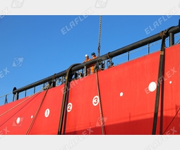 Cargo loading of a tanker with petroleum based products; FHD hose assembly with new longitudinal stripe to avoid torsion